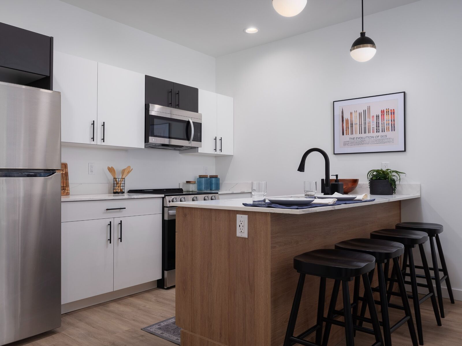 Kitchen with quartz countertops and stainless appliances